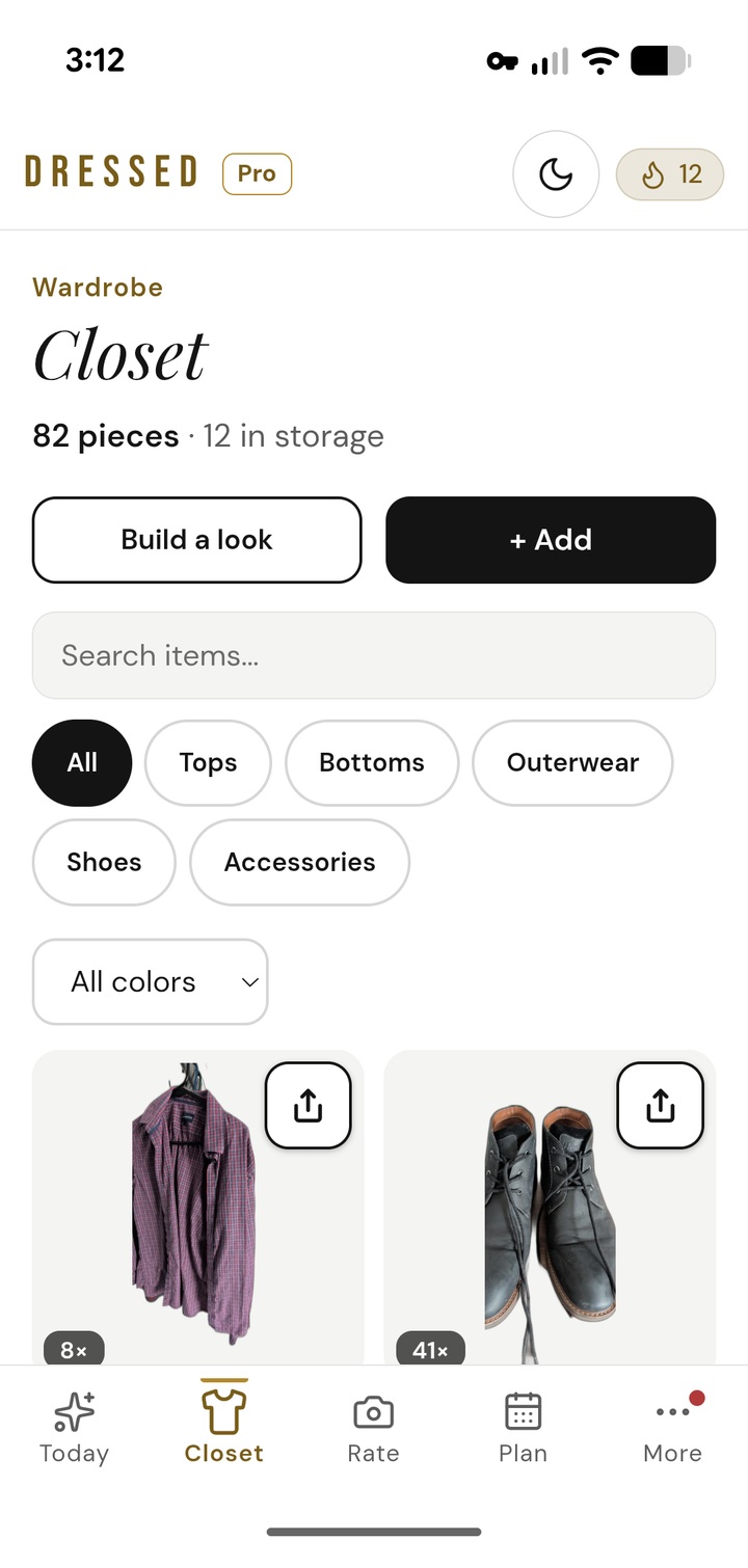 Screenshot of the DRESSED app closet view showing 82 wardrobe pieces with category filters